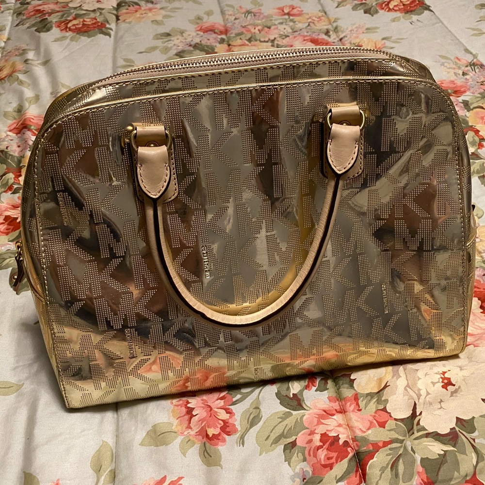 Gold Michael Kors satchel crossbody.